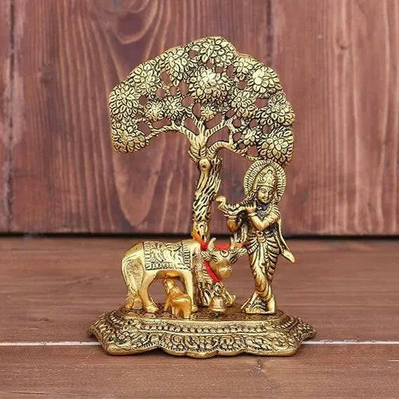 Fashtales Handicrafts Home Decor & Gifts Metal Krishna With Cow Standing Under Tree Plying Flute (Gold, 12.5X8X16Cm), 1 Piece
