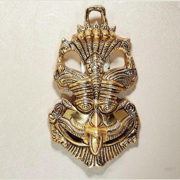 Fashtales handicrafts Metal Feng Shui Vastu Showpiece Nazar Battu with Naag Ganesha Suraksha Kawach Mask for Evil Eye Protection for Home, Office Wall & Door Hanging (Gold, Medium)