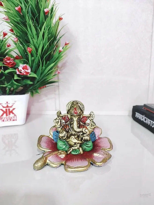 Fashtales handicrafts Metal Ganesh On Multi Color Leaf for Home Decor and Gift Purpose(12 x12 x 8 cm)