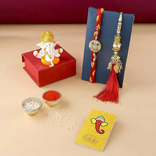 Fashtales Handicrafts Rakhi Gift for Brother Bhabhi with Showpiece Combo Gift- Kundan Rakhi, Red Floral Lumba Rakhi for Brother Bhabhi with Figurine