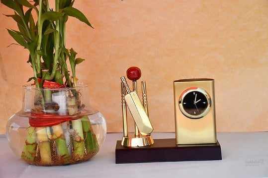 Rakhi for Brother with Gift -Religious Rakhi for Bhaiya with Greeting Card and Metal Cricket Pen Stand With Analog Watch - Roli Chawal