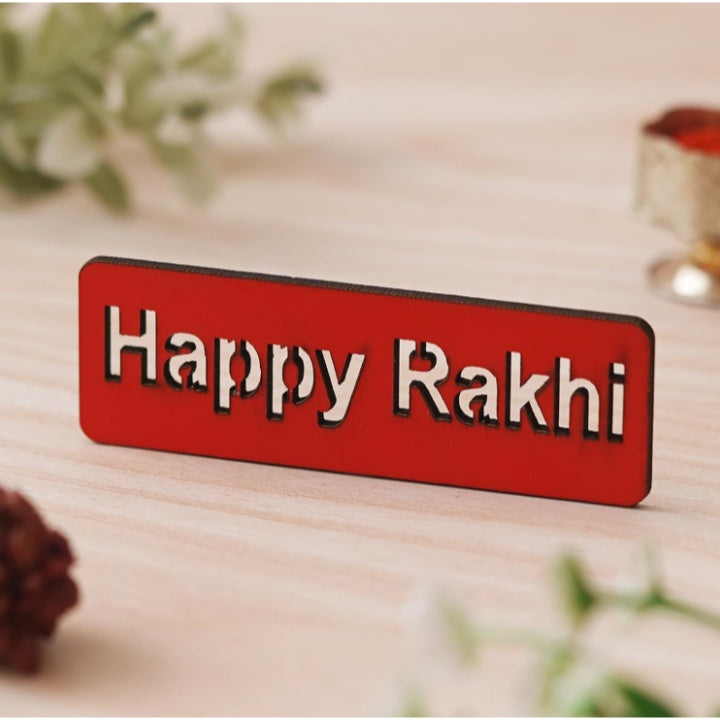 Fashtales Handicrafts Golden Beads, Om Symbol Religious Designer Rakhi with Roli Chawal Pack and Happy Rakhi Wooden Cutout