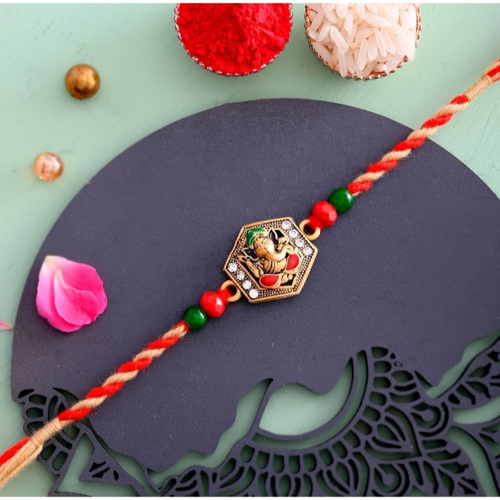 Fashtales Handicrafts Ganesha Idol and Rakhi for Brother Combo Set | Combo of 6 (1 Ganesha ldol, 2 Rakhi, 1 Roli Chawal Pack, 1 Greeting Card, 1 Keychain) Best Rakhi Gift for Brother (KGG1-C7-TW1)